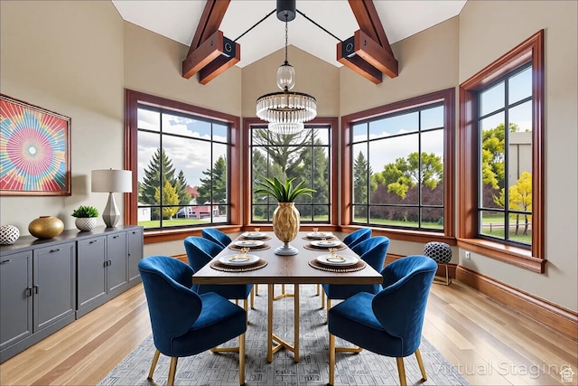 2499 River Meadows Ln, Midway, UT 84049 - dining room featuring a chandelier, light wood-type flooring, beam ceiling, high vaulted ceiling, and plenty of natural light