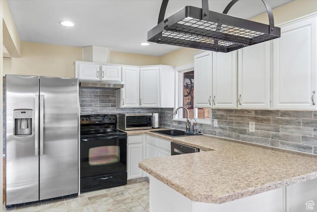 108 W 4300 S, Washington Terrace, UT 84405 - kitchen with light countertops, exhaust hood, white cabinets, stainless steel appliances, and a sink