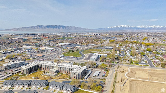 birds eye view of property featuring a mountain view