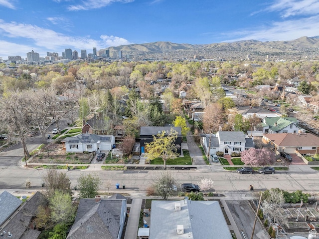 drone / aerial view featuring a mountain view and a residential view