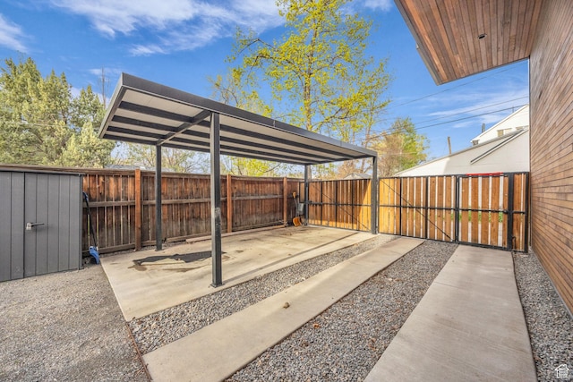 view of patio / terrace with fence and a gate