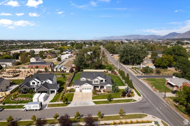 drone / aerial view featuring a mountain view and a residential view