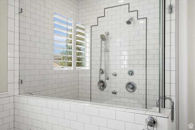 bathroom with a stall shower