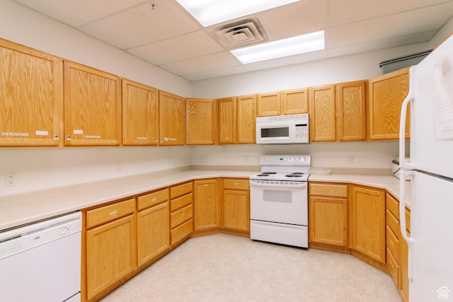 502 S 1040 E Unit 133, American Fork, UT 84003 - kitchen with white appliances, visible vents, a drop ceiling, and light countertops