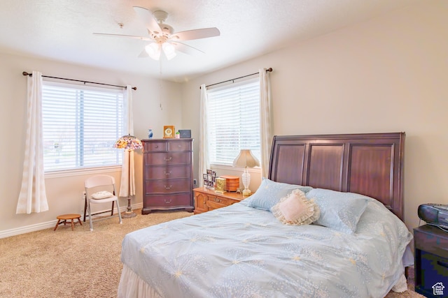 502 S 1040 E Unit 133, American Fork, UT 84003 - bedroom featuring baseboards, a ceiling fan, and light colored carpet