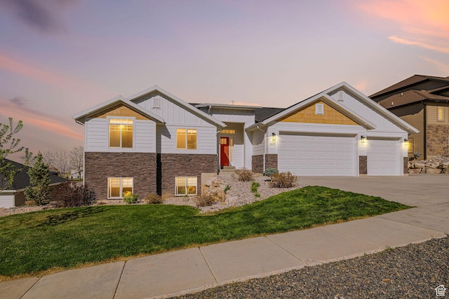 view of front of property featuring an attached garage, board and batten siding, concrete driveway, and stone siding