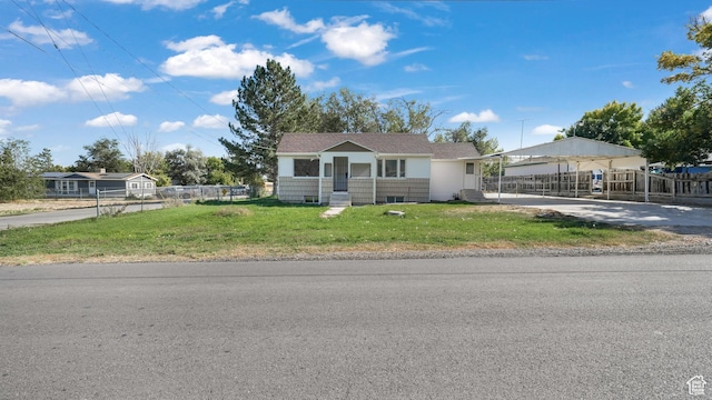 55 S Cooley St, Grantsville, UT 84029 - bungalow featuring concrete driveway, fence, and a front lawn