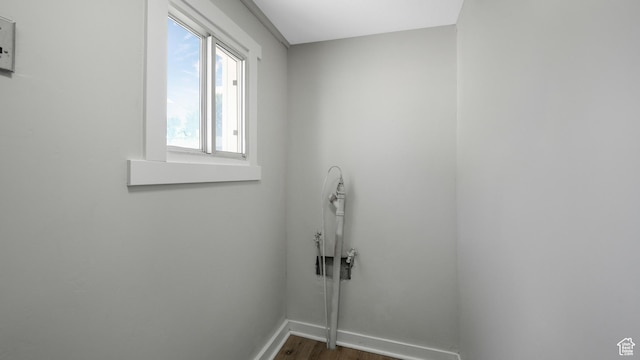 55 S Cooley St, Grantsville, UT 84029 - washroom with dark wood-style flooring and baseboards