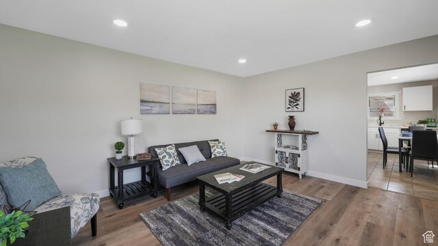 55 S Cooley St, Grantsville, UT 84029 - living area with recessed lighting, light wood-style floors, and baseboards