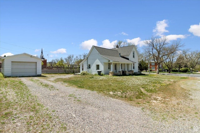 205 S Main St, Manti, UT 84642 - view of side of home with driveway, fence, and a garage