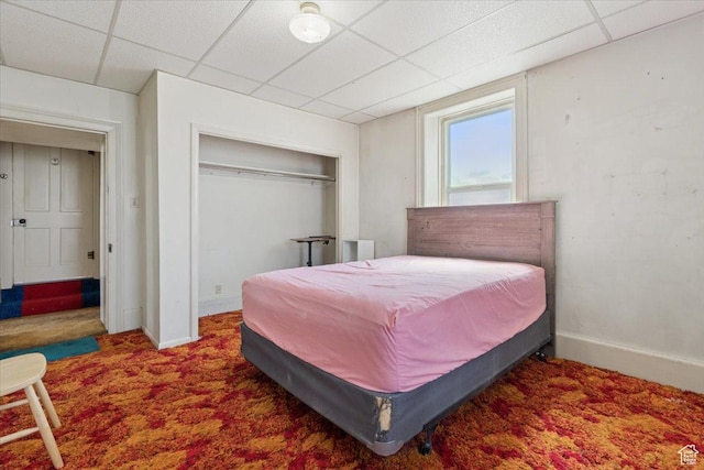 205 S Main St, Manti, UT 84642 - bedroom featuring a paneled ceiling, baseboards, a closet, and carpet floors