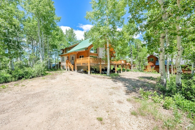 11551 E Marigold Ln Unit 1659, Heber City, UT 84032 - view of front facade with a wooden deck and metal roof