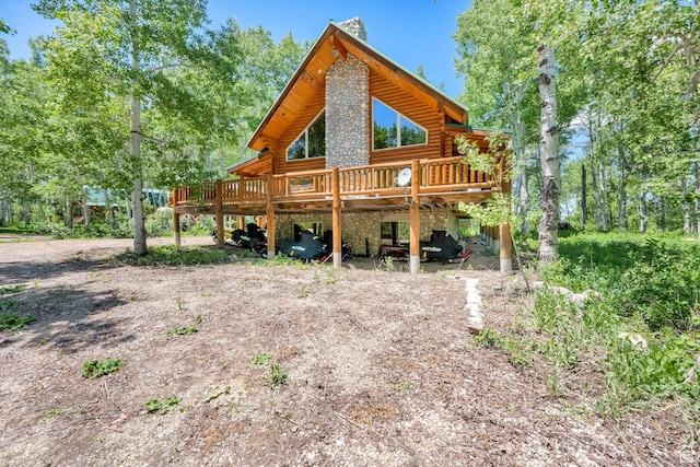 11551 E Marigold Ln Unit 1659, Heber City, UT 84032 - back of house featuring log siding, a deck, and stone siding