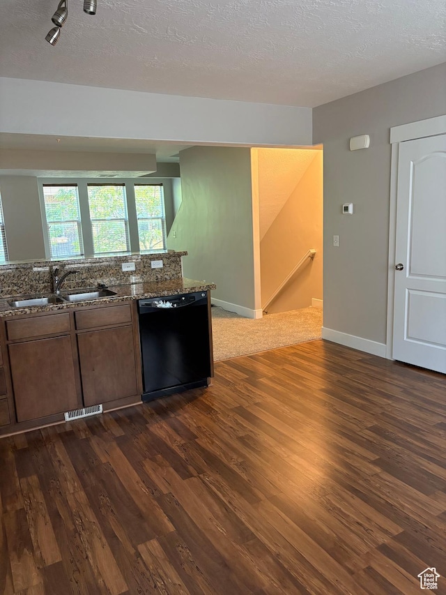 162 W Barry Links Way S, South Salt Lake, UT 84115 - kitchen with black dishwasher, dark wood-type flooring, stone countertops, and a textured ceiling