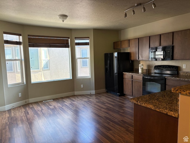 162 W Barry Links Way S, South Salt Lake, UT 84115 - kitchen featuring black appliances, dark countertops, baseboards, dark wood-style floors, and a textured ceiling