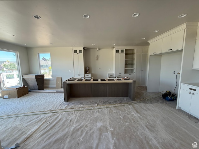 1362 S 1960 W Unit 3, Lehi, UT 84043 - kitchen with white cabinets, a center island, and recessed lighting