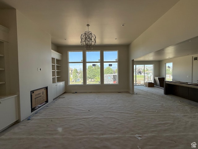 1362 S 1960 W Unit 3, Lehi, UT 84043 - unfurnished living room with a chandelier, built in features, and recessed lighting
