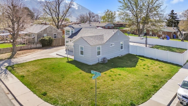 drone / aerial view featuring a mountain view and a residential view