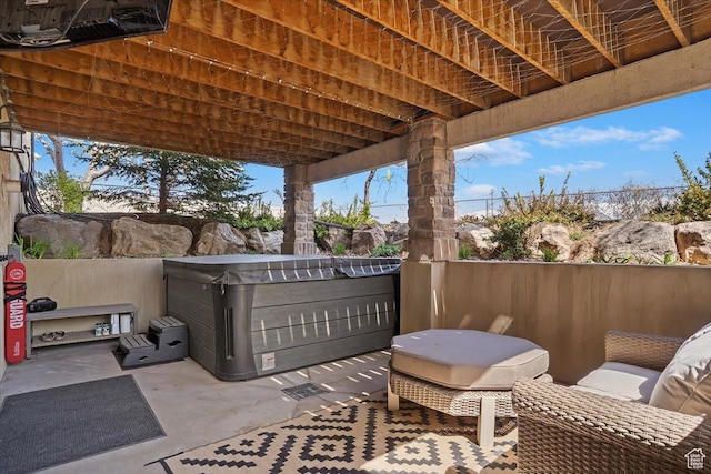 view of patio / terrace featuring a hot tub