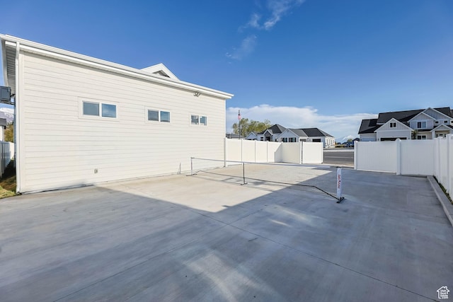 view of patio featuring fence