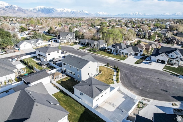 drone / aerial view featuring a mountain view and a residential view