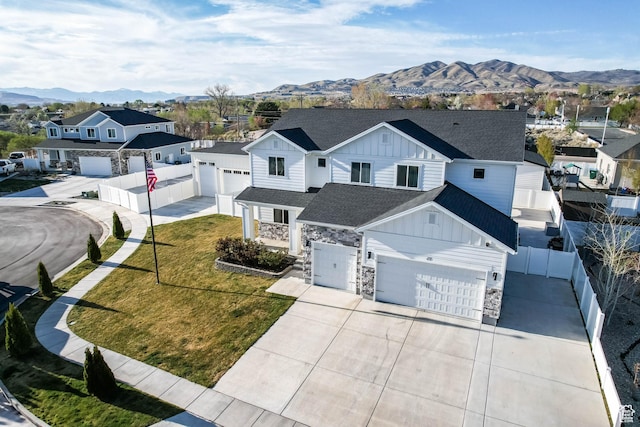 aerial view featuring a residential view and a mountain view