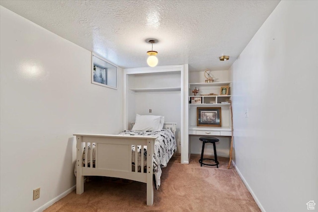 39 S 200 W, Morgan, UT 84050 - carpeted bedroom featuring a textured ceiling and baseboards