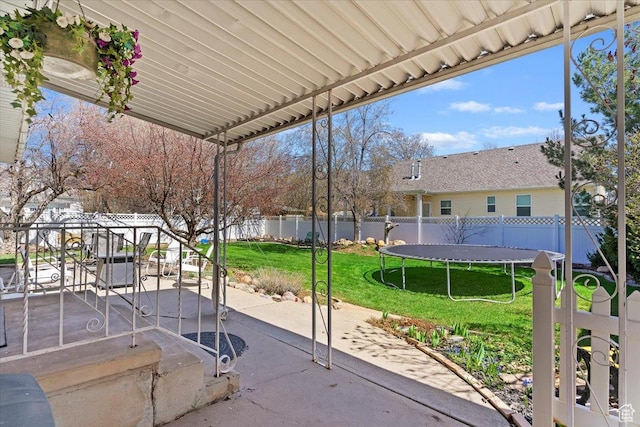 39 S 200 W, Morgan, UT 84050 - view of patio featuring a trampoline, a fenced backyard, outdoor dining space, and a water view