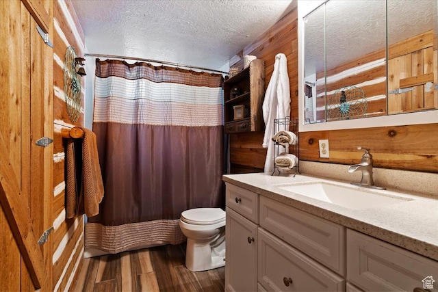39 S 200 W, Morgan, UT 84050 - full bathroom with a shower with curtain, toilet, a textured ceiling, vanity, and wood finished floors