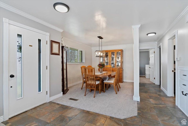 39 S 200 W, Morgan, UT 84050 - dining area featuring crown molding, baseboards, stone tile flooring, and washer / dryer