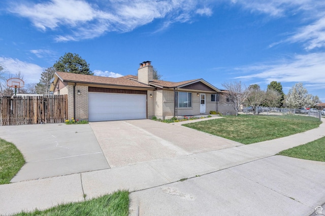 4926 S 3655 W, Taylorsville, UT 84129 - single story home featuring concrete driveway, an attached garage, fence, and a front lawn