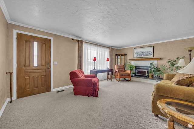 4926 S 3655 W, Taylorsville, UT 84129 - carpeted living room featuring a textured ceiling, ornamental molding, a fireplace with raised hearth, visible vents, and baseboards