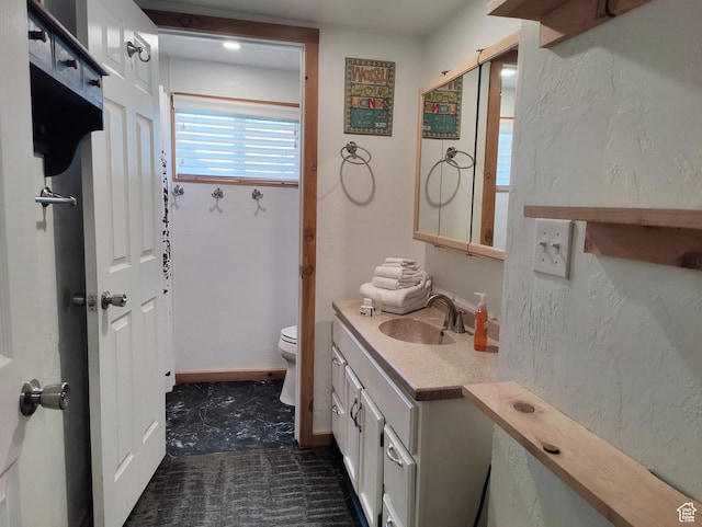1559 S Bear Lake Blvd S, Garden City, UT 84028 - bathroom featuring toilet and vanity