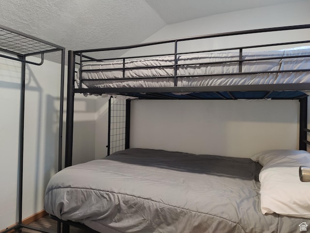 1559 S Bear Lake Blvd S, Garden City, UT 84028 - bedroom featuring vaulted ceiling
