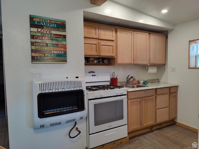 1559 S Bear Lake Blvd S, Garden City, UT 84028 - kitchen featuring a sink, light countertops, heating unit, recessed lighting, and white gas range