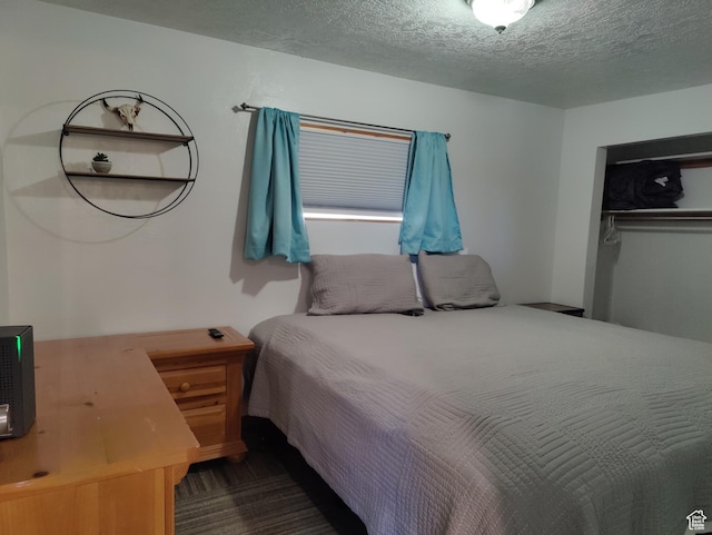 1559 S Bear Lake Blvd S, Garden City, UT 84028 - bedroom featuring a textured ceiling and a closet