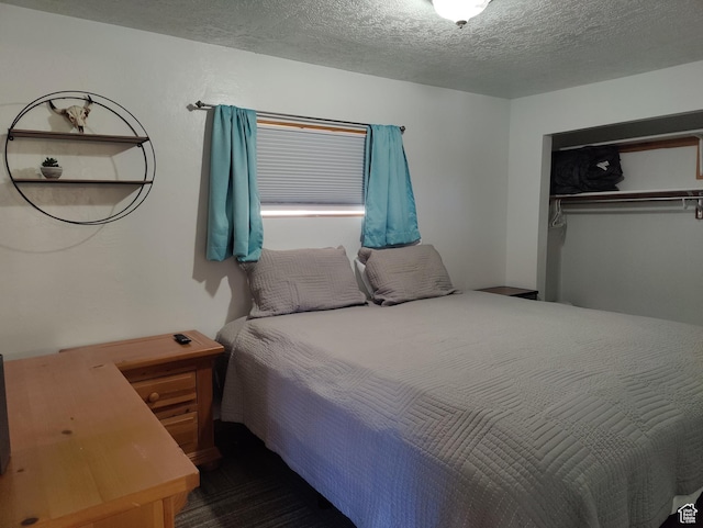 1559 S Bear Lake Blvd S, Garden City, UT 84028 - bedroom featuring a textured ceiling and a closet