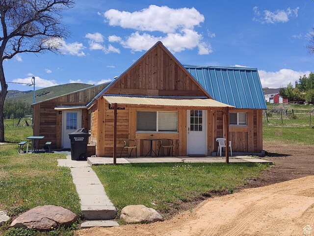 1559 S Bear Lake Blvd S, Garden City, UT 84028 - view of front of home featuring metal roof