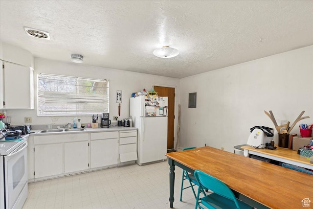 250 N 350 E, Orem, UT 84057 - kitchen with white appliances, a textured ceiling, white cabinetry, light countertops, and a sink