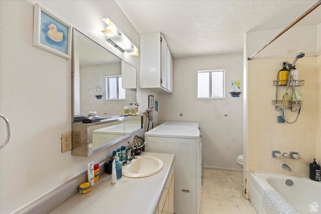 250 N 350 E, Orem, UT 84057 - bathroom with vanity, tile patterned floors, a textured ceiling, toilet, and washer / dryer