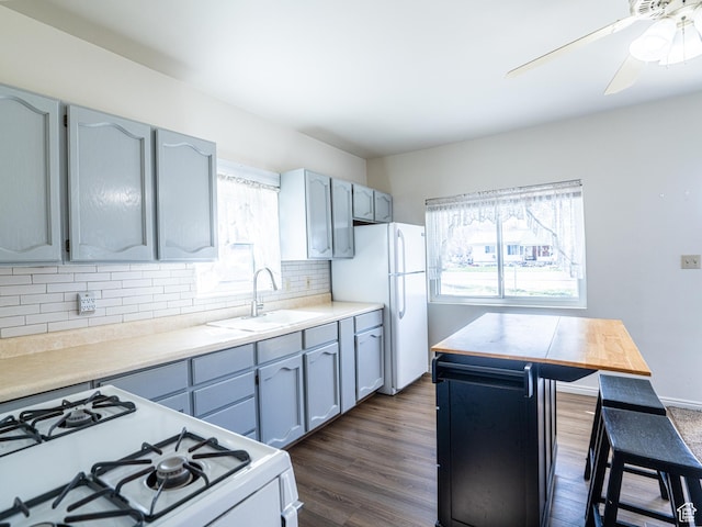 290 W 400 S, Heber City, UT 84032 - kitchen with ceiling fan, white appliances, dark wood-type flooring, tasteful backsplash, and a sink