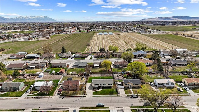 drone / aerial view featuring a mountain view and a residential view
