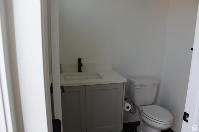 2892 E 1400 S, St George, UT 84790 - bathroom with vanity, toilet, baseboards, and tile patterned flooring