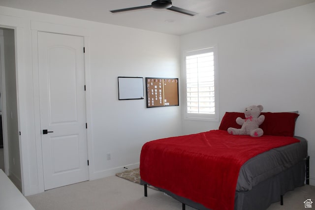 2892 E 1400 S, St George, UT 84790 - carpeted bedroom with a ceiling fan and baseboards