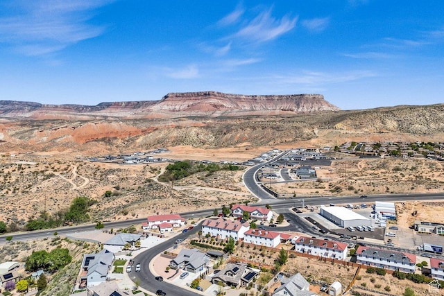 bird's eye view with a mountain view and view of desert