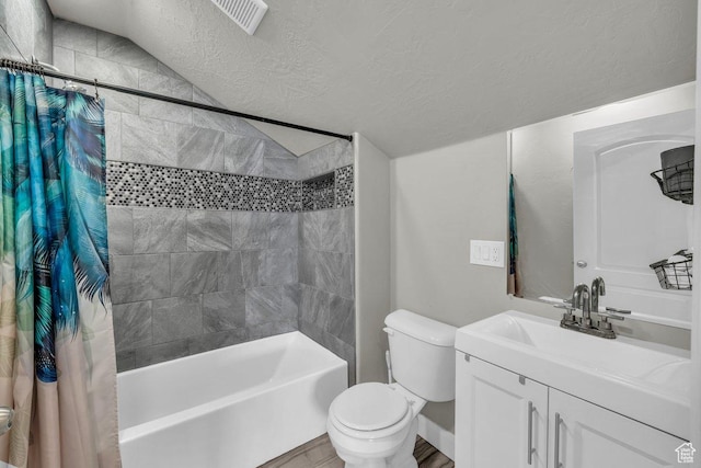 full bath with visible vents, shower / bath combination with curtain, toilet, a textured ceiling, and vanity