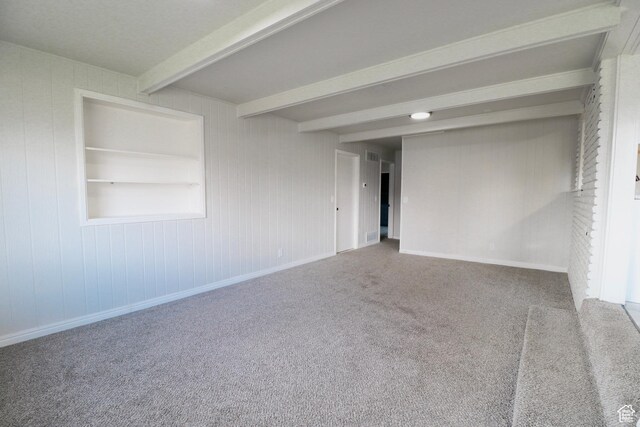 4503 S 2025 W, Roy, UT 84067 - empty room with beamed ceiling, carpet, and baseboards