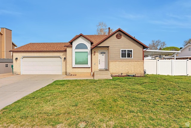 view of front facade featuring a garage, fence, brick siding, a front lawn, and driveway