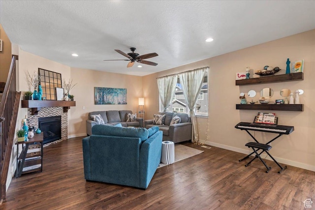 12133 S Broken Arch Ln, Herriman, UT 84096 - living room with dark wood-style floors, baseboards, and a ceiling fan
