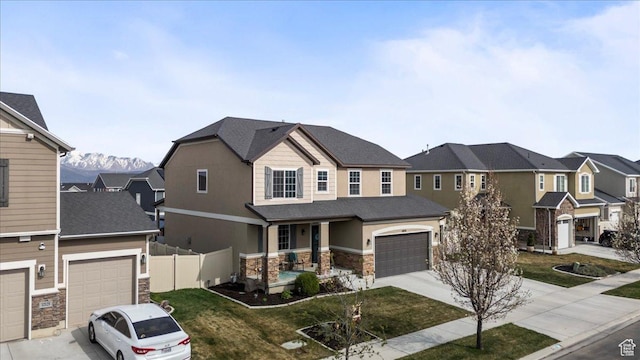 12133 S Broken Arch Ln, Herriman, UT 84096 - view of front of home featuring fence, stone siding, a residential view, and driveway